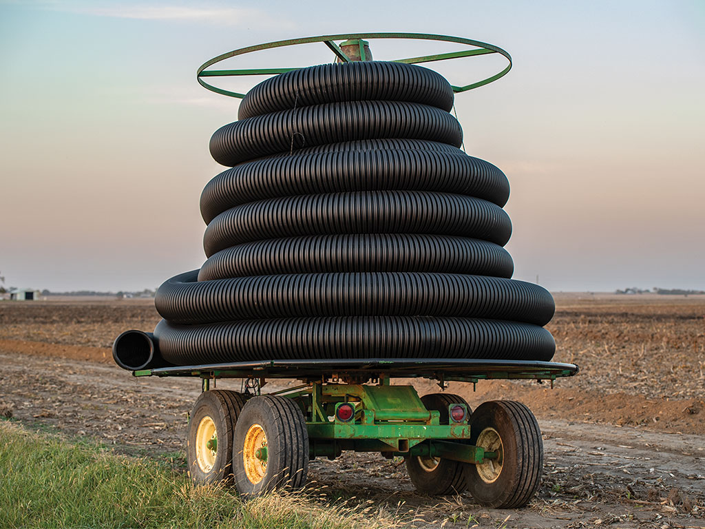 Farming equipment operating in a field   