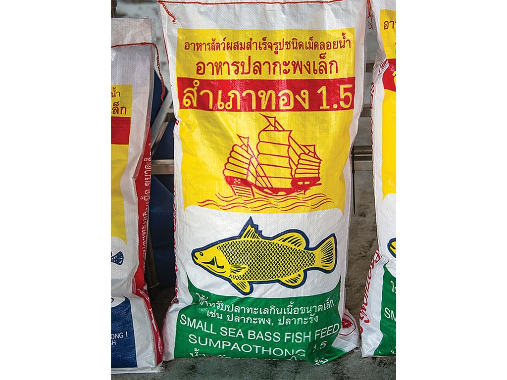 A white soy fish pellet bag with a red ship and yellow fish logo